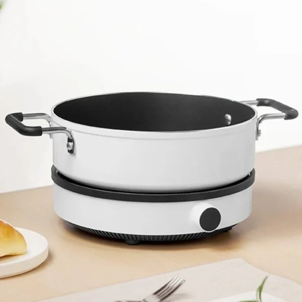 اجاق القایی شیائومی نسخه لایت | Mi Induction Cooker Lite با طراحی مدرن، تنظیم 9 سطحی دما و توان 2100 وات، انتخابی مناسب برای پخت و پز سریع و ایمن است.